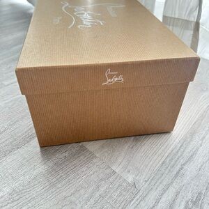 One empty, Christian Louboutin women's shoebox size 38